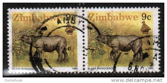 ZIMBABWE  Scott #  619  VF USED Pair - Zimbabwe (1980-...)