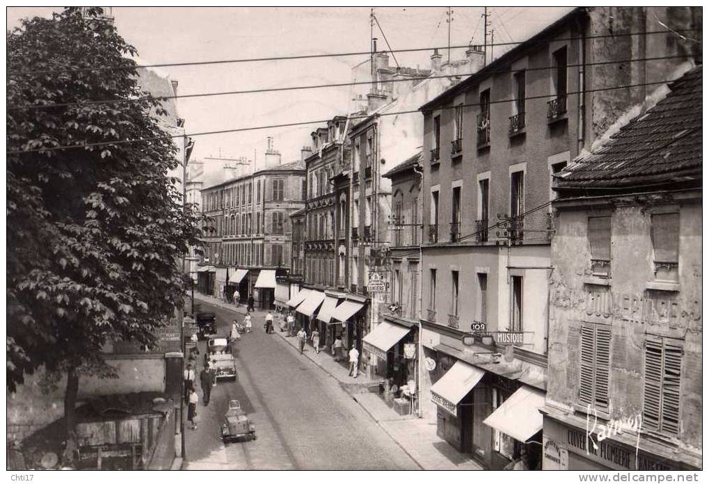 NOGENT SUR MARNE LA GRAND RUE AVEC COMMERCES  EDIT  RAYMON    CIRC  1954 - Nogent Sur Marne