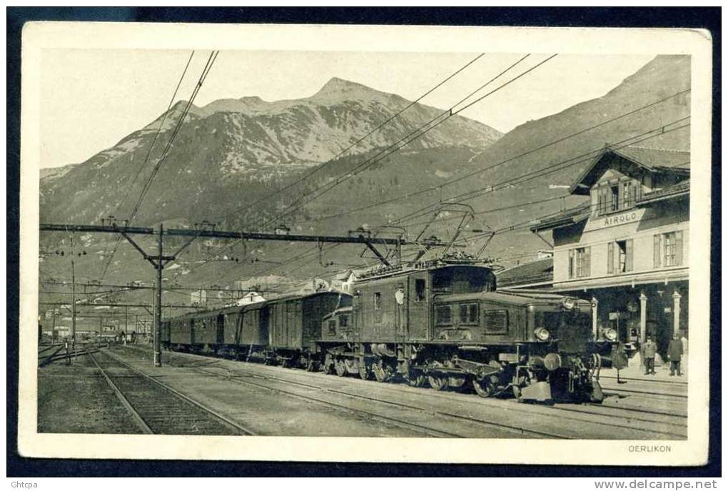 CPSM.  AIROLO Gare. Ligne Du GOTHARD. Train C.F.F., Remorqué Par Une Locomotive électrifiée Type OERLIKON. - Autres & Non Classés