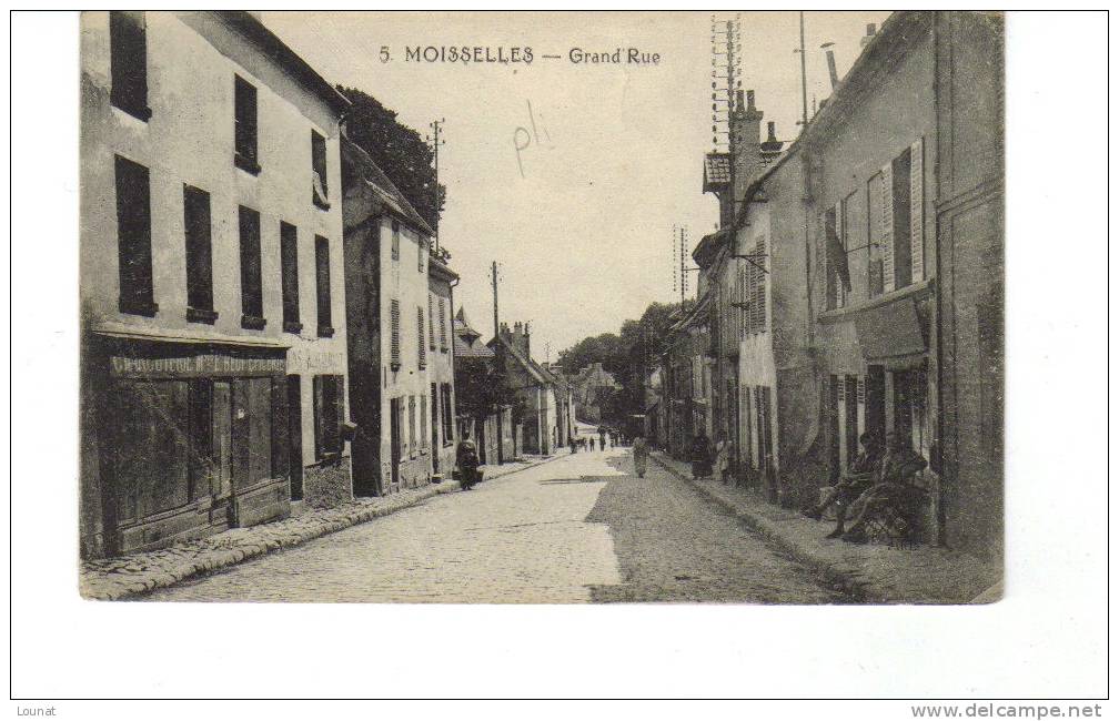 95 MOISSELLES - Grand'Rue (en L´état :  Pli ) - Moisselles