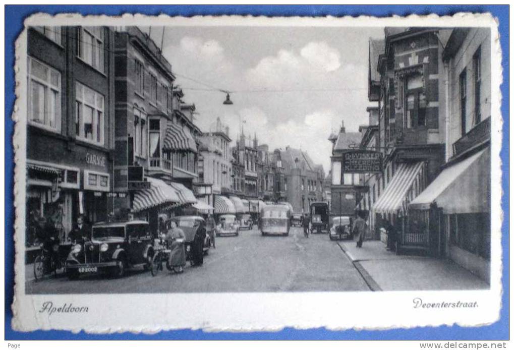 Apeldoorn,Deventerstraat, 1930-1940,Geschäfte,Oldtimer,Radfahrer,Passanten,Zeitdokument, - Apeldoorn