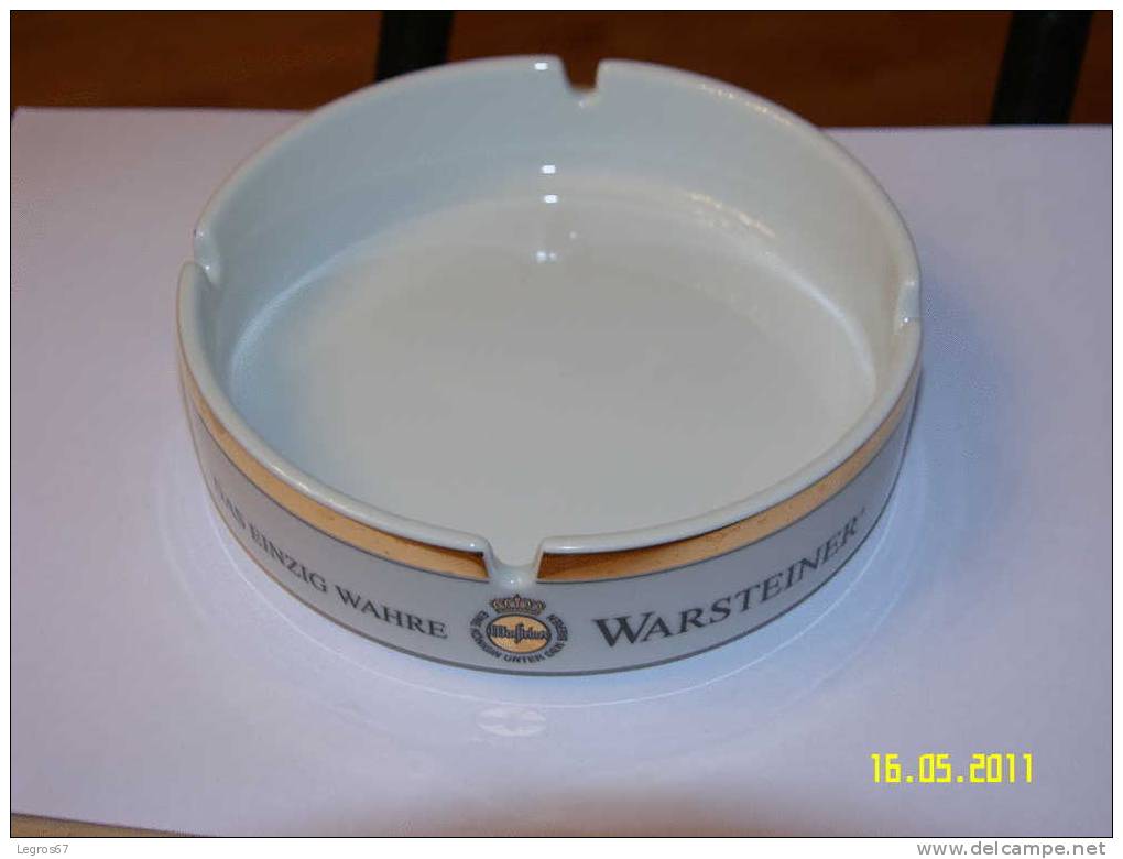 CENDRIER PUBLICITAIRE - WARSTEINER - Porcelaine