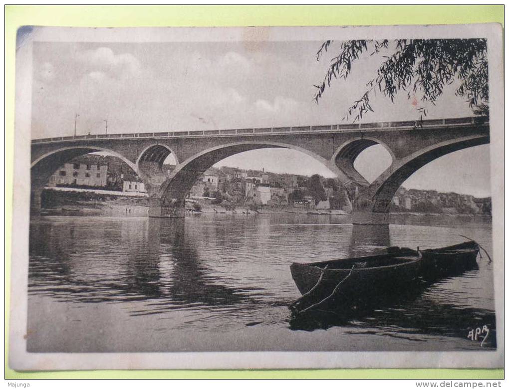 CPA - TONNEINS - VUE A TRAVERS LE PONT SUR LA GARONNE - Tonneins