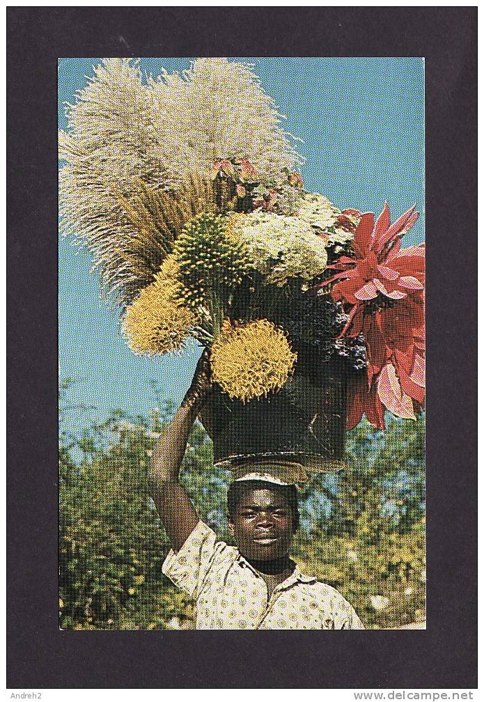 HAITI - FLOWER VENDOR TO THE MARKET  - FLEUR - PHOTOGRAPHY BY WALLY TURNBULL - Haiti