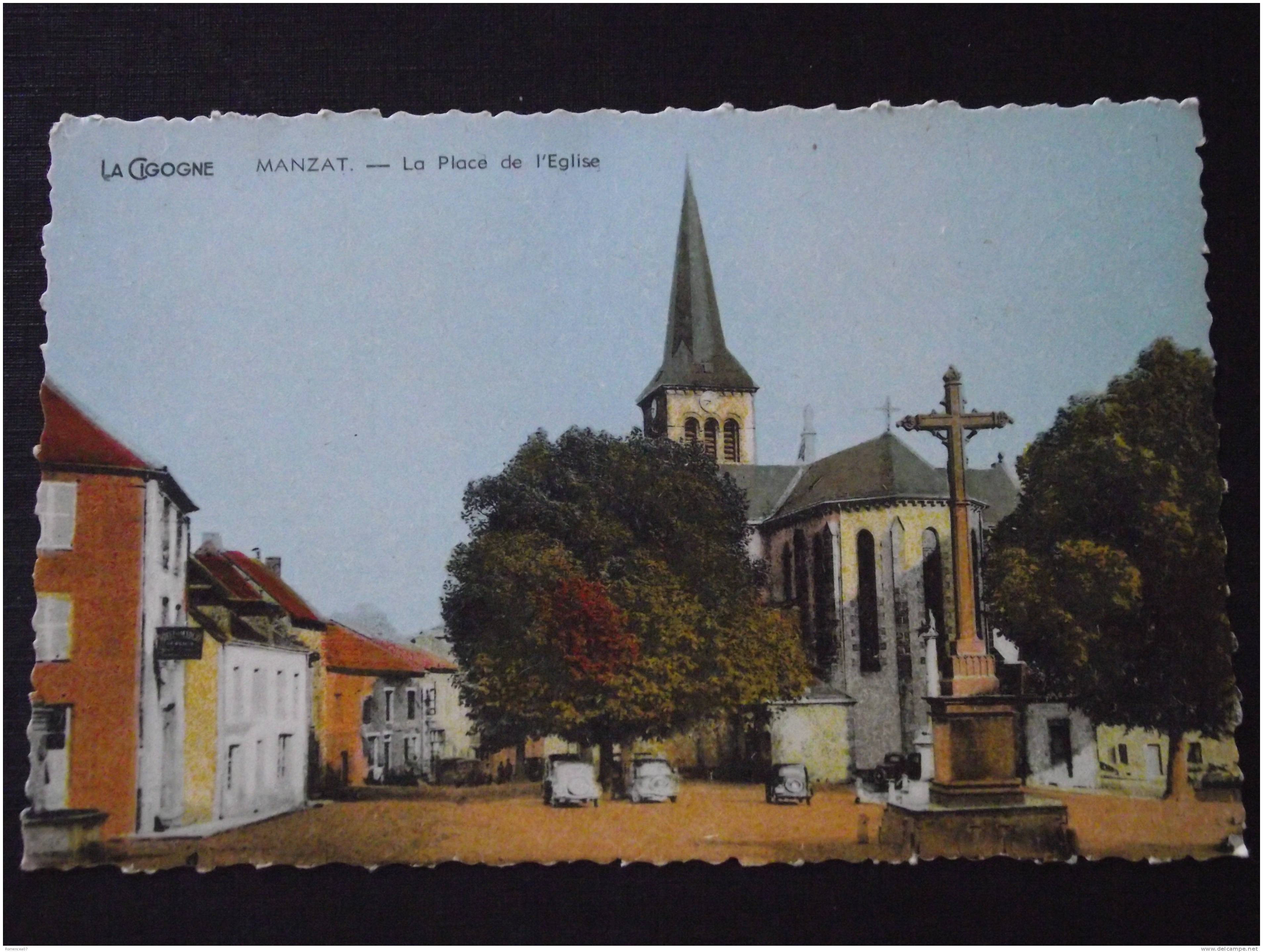 MANZAT (Puy-de-Dôme) - La Place De L'Eglise - Calvaire - Commerce - Non Voyagée - Ed. "La Cigogne" - Manzat