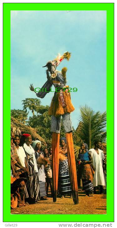 CÔTE D´IVOIRE - LE DANSEUR ÉCHASSIER RÉGION DE MAN  - PHOTO J.C. NOURAULT - DIMENSION 10.5 X 21cm - - Côte-d'Ivoire