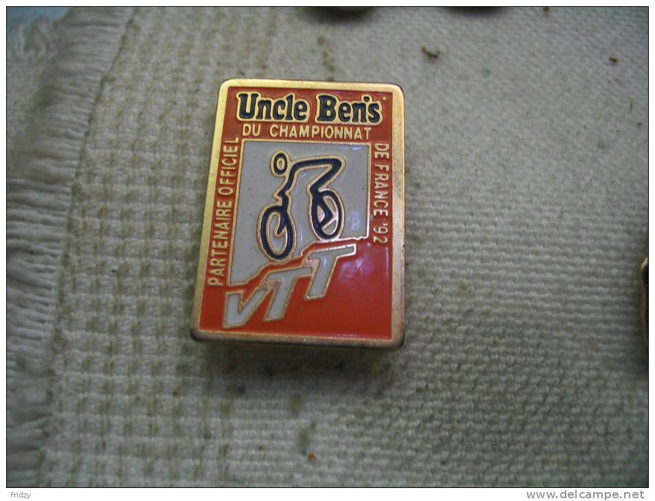 Pin´s Vélo: Uncle Ben's Partenaire Officiel Du Championnat De France 92 De VTT - Cyclisme