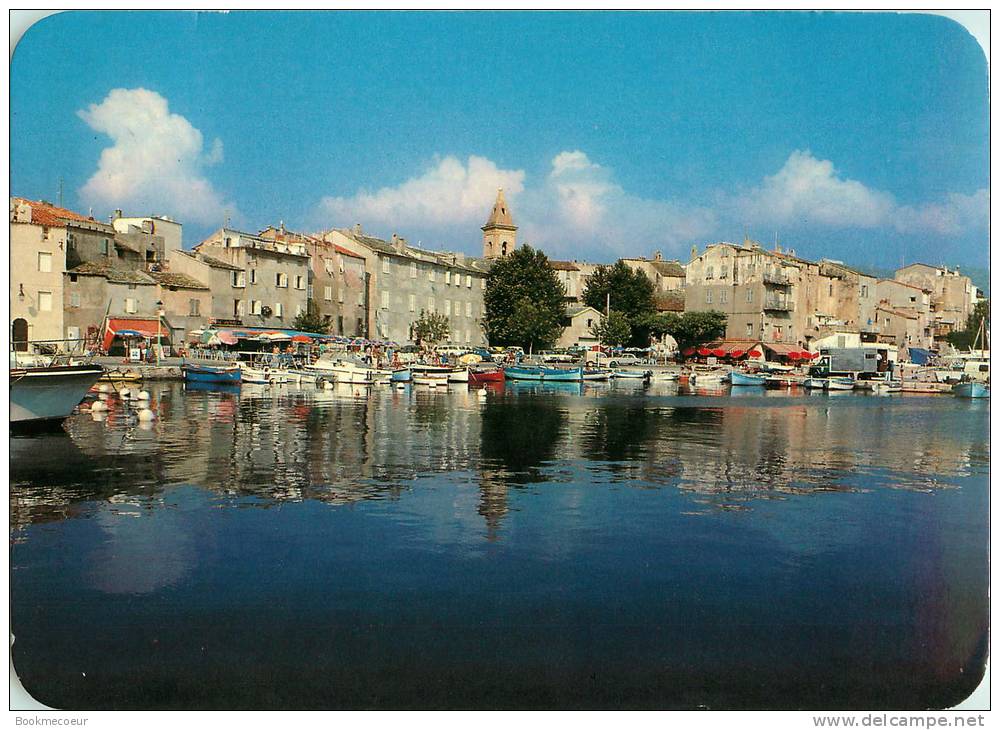 20   PANORAMA DE LA  CORSE  ST FLORENT  LES EAUX CALMES DU PORTMELENT DANS.....LES FACADES ELEGANTES DES HABITATIONS - Corse