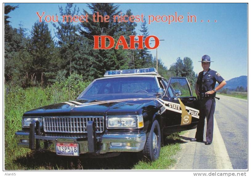 Greetings From Idaho, State Patrol Highway Police Officer And Car C1990s/2000s Vintage Postcard - Autres & Non Classés