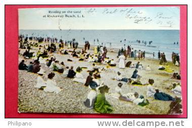 - New York > Long Island   Resting On The Sand At Rockaway Beach   1919  Cancel-- Ref 401 - Long Island