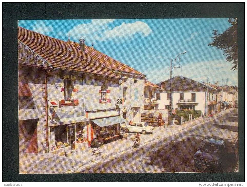 CPSM - Monthureux Sur Saône (88) - Rue Du General Leclerc ( Commerce COOP Presse Landau Velo Simca 1000 LA CIGOGNE) - Monthureux Sur Saone