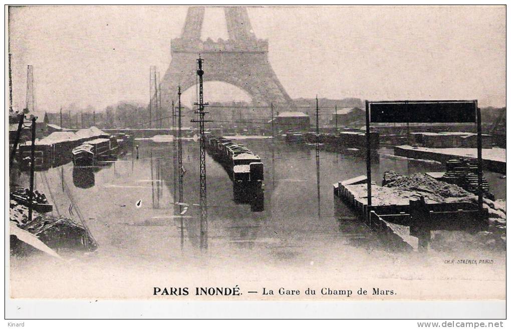 CPA ..PARIS INONDE...LA GARE DU CHAMP DE MARS ..form:136x80..... TBE...V..SCAN. - Transport Urbain En Surface