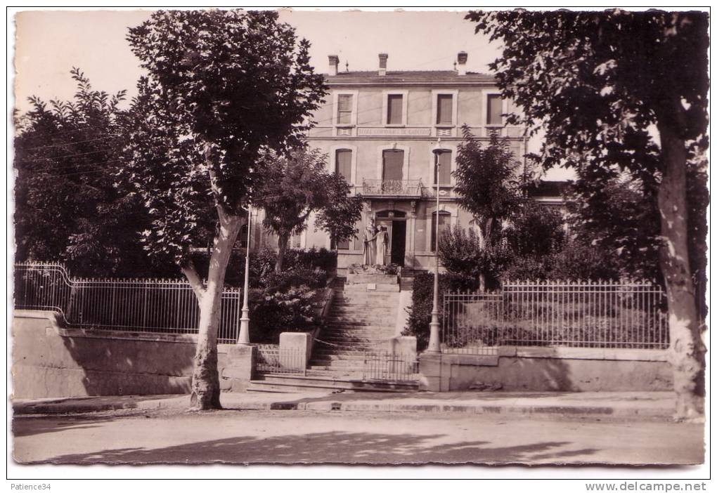 Département 34: CAPESTANG - Ecole Des Garçons Et Monument Aux Morts - Capestang