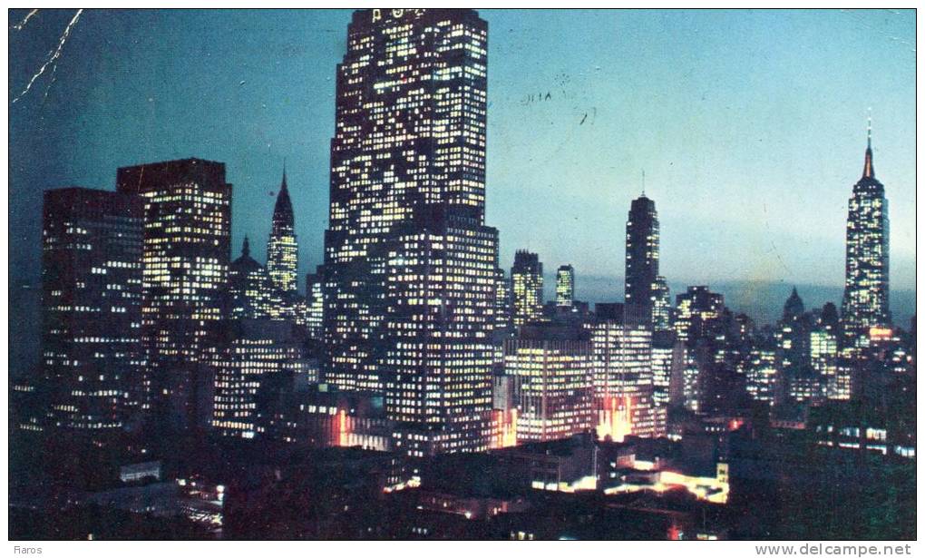 United States- Midtown Skyline At Night [w/ Propaganda& Meter Pks +additional Tax On Postage By Another Pk] CPM Postcard - Manhattan