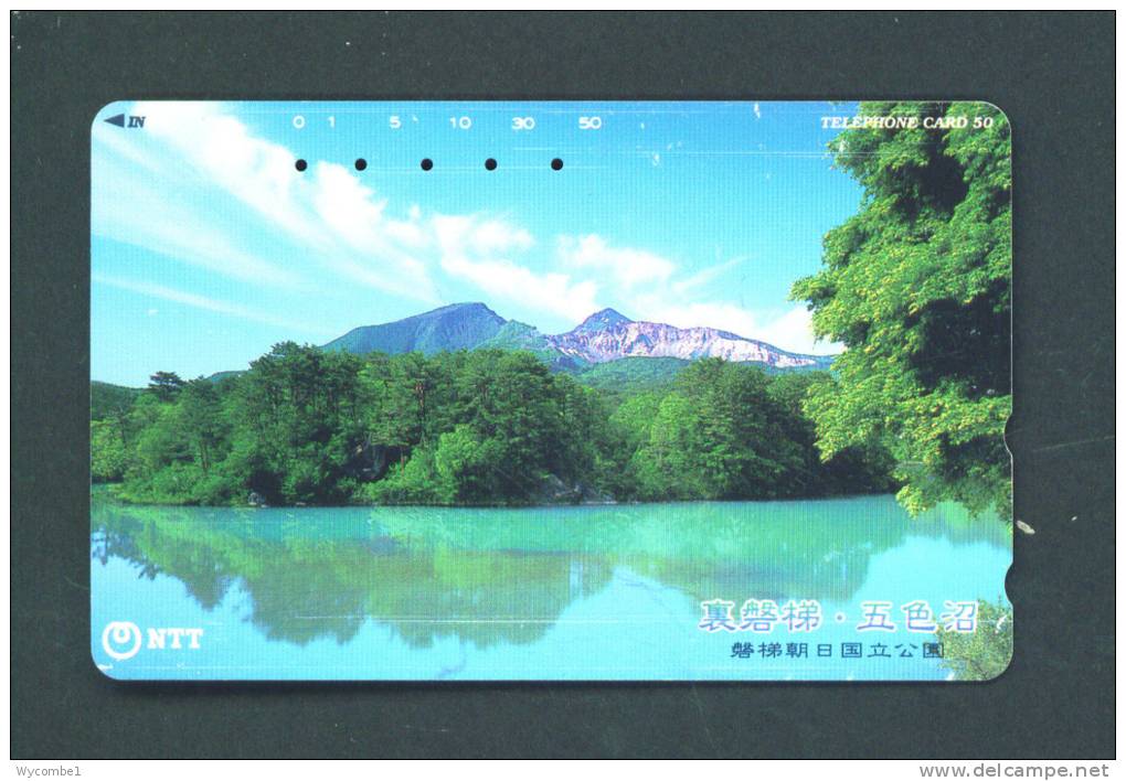 JAPAN  -  Magnetic Phonecard As Scan (411-264) - Japan