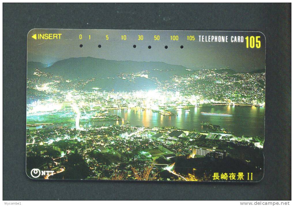JAPAN  -  Magnetic Phonecard As Scan (390-249) - Japan