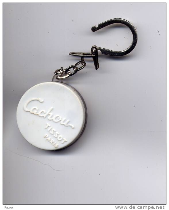 PORTE  CLE   PUBLICITAIRE  "CACHOU TISSOT  "  AVEC DISTIBUTEUR DE CACHOUS AU DOS  /  TRES ORIGINAL /  T.BIEN - Key-rings