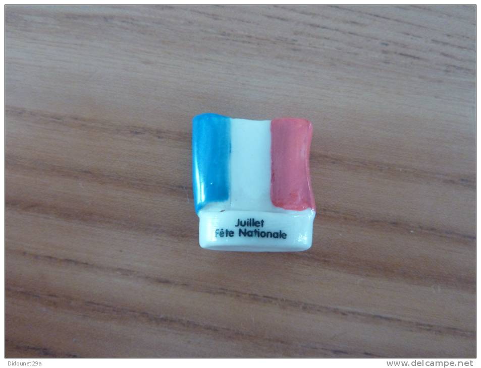 Fève "Juillet Fête Nationale" (drapeau Tricolore France) - Histoire
