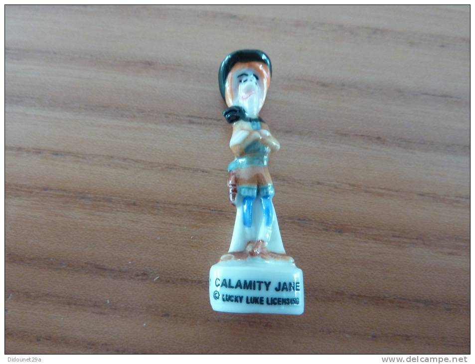 Fève LUCKY LUKE LISENCING "CALAMITY JANE" - Strip