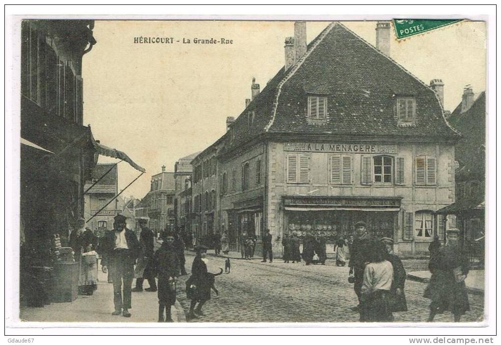 HERICOURT (HAUTE SAONE) - CPA - LA GRANDE RUE - MAGASIN "A LA MENAGERE" - Autres & Non Classés