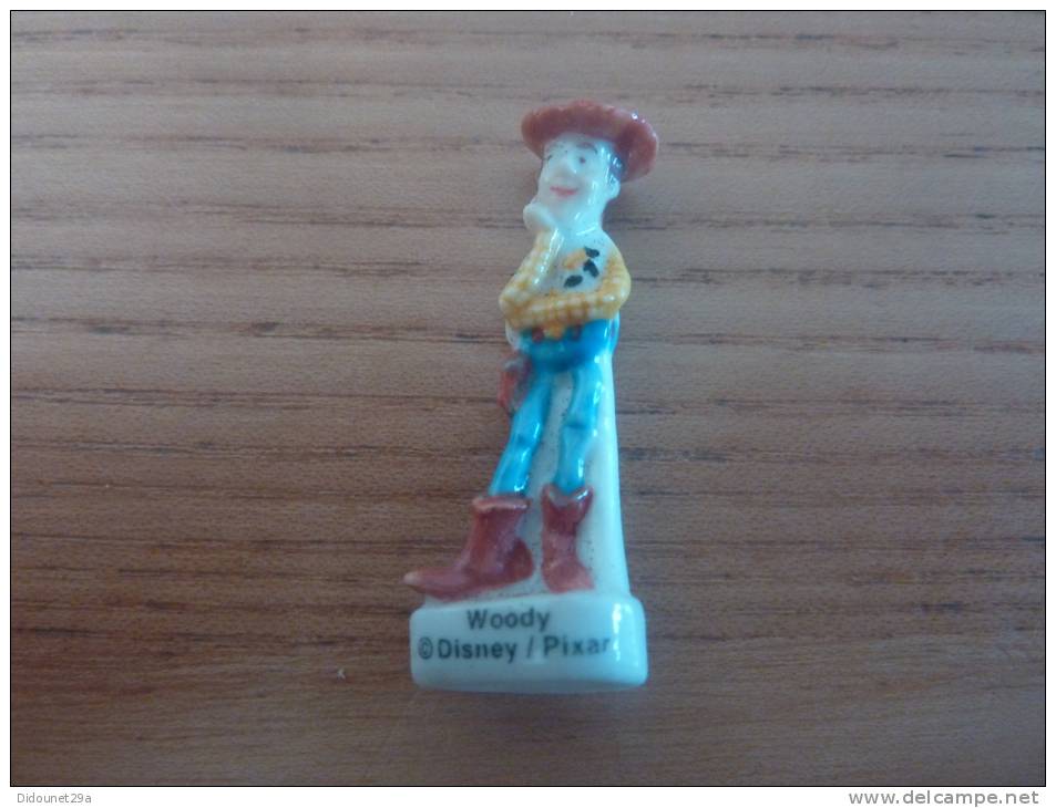 Fève "Woody" DISNEY/PIXAR (TOY STORY) - Disney