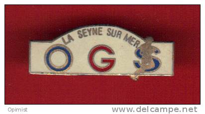 24659-pin's Athletisme.course A Pied.OGS.la Seyne Sur Mer.numéroté 376. - Athletics