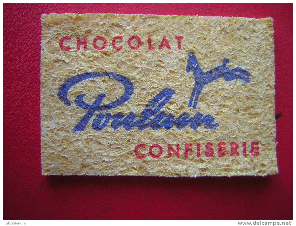 PETITE EPONGE ( COMPRESSEE N´A PAS ENCORE ETE MOUILLEE ) CHOCOLAT POULAIN CONFISERIE - Chocolade