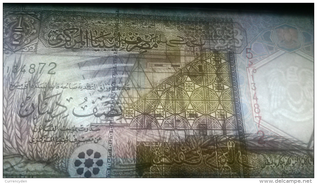 Libya P-53, 1/2 Dinar, Oil Refinery / Irriagated Field (1990)  UNC See Uv & Watermarks - Libia