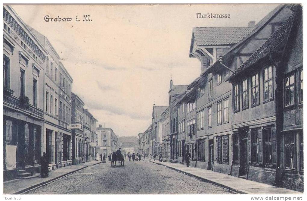 GRABOW Marktstrasse Belebt Pferde Wagen Geschäfte 1909 Gedruckt Bläulich Gelaufen 23.6.1916 Als Feldpost - Ludwigslust