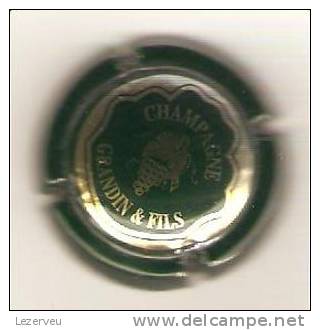 CAPSULE DE MUSELET CHAMPAGNE GRANDIN ET FILS FEUILLE DE VIGNE ET GRAPPE RAISIN - Autres & Non Classés