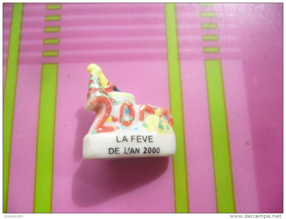 Fève  Serie LA FEVE DE L' AN 2000 - Autres & Non Classés