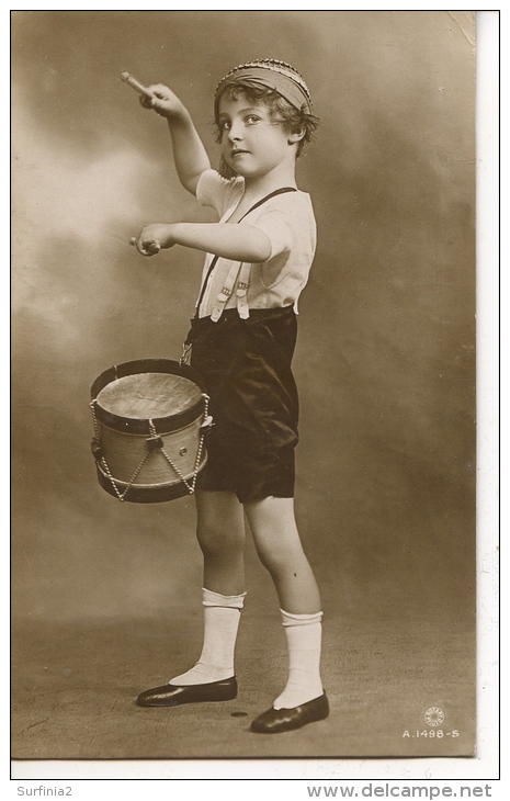 YOUNG GIRL BANGING A DRUM  RP - Portraits