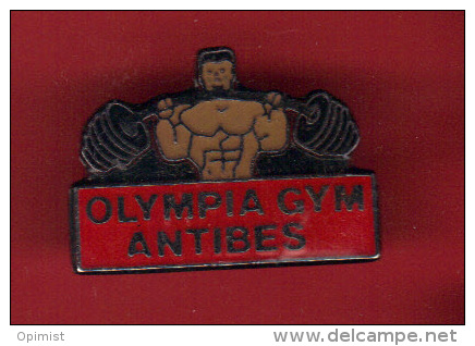 28773-Pin's .Halterophilie.culturisme .musculation.Antibes.Olym Pia Gym - Weightlifting