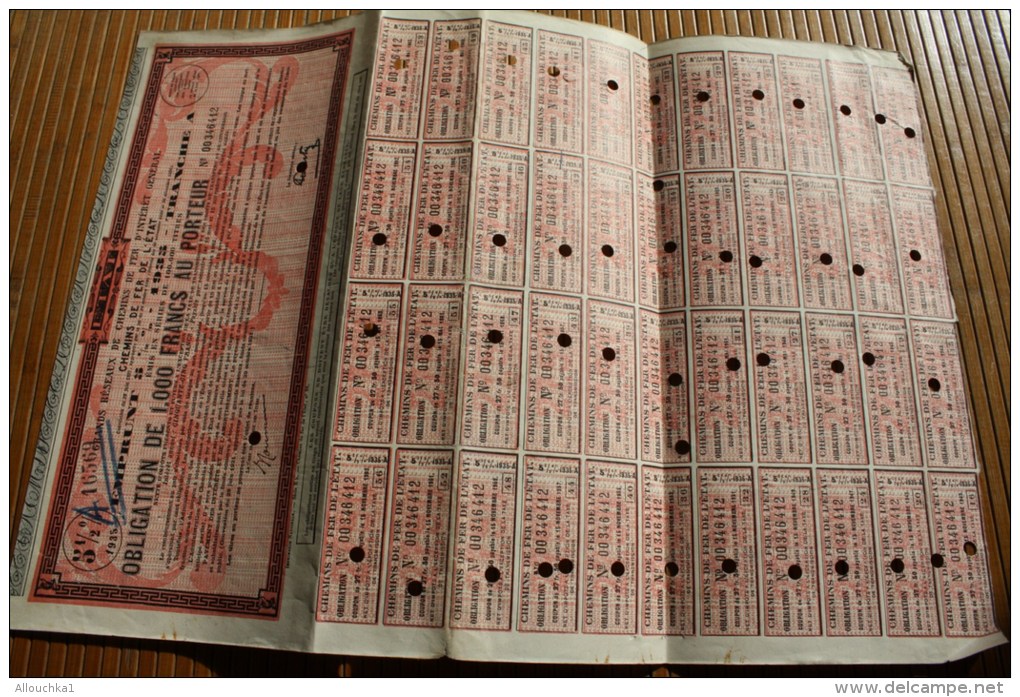 SNCF Compagnie Chemin De Fer De L´État Emprunt 5 % Obligation 1000 Fr. 1935 Tran A Titre Action Perforé Perforations - Chemin De Fer & Tramway