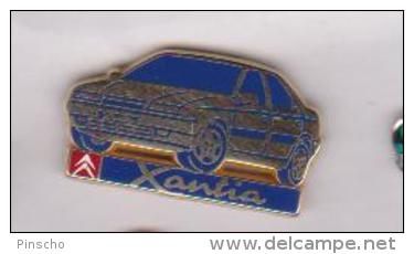 Pin's CITROEN XANTIA  Signé ARTHUS BERTRAND - Citroën