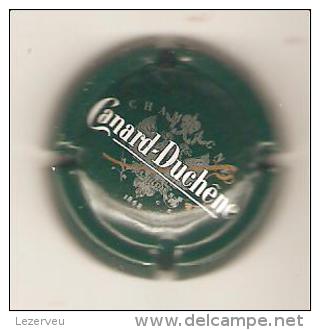 CAPSULE DE MUSELET CHAMPAGNE CANARD DUCHENE BLANC FOND VERT FONçé - Canard Duchêne