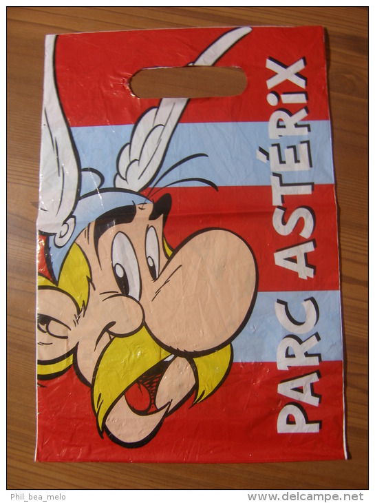 ASTERIX - PARC ASTERIX SACHET PLASTIQUE PUBLICITAIRE 2011 PETIT FORMAT - OCCASION BON ETAT PAS TROU NI DECHIRURE - Asterix