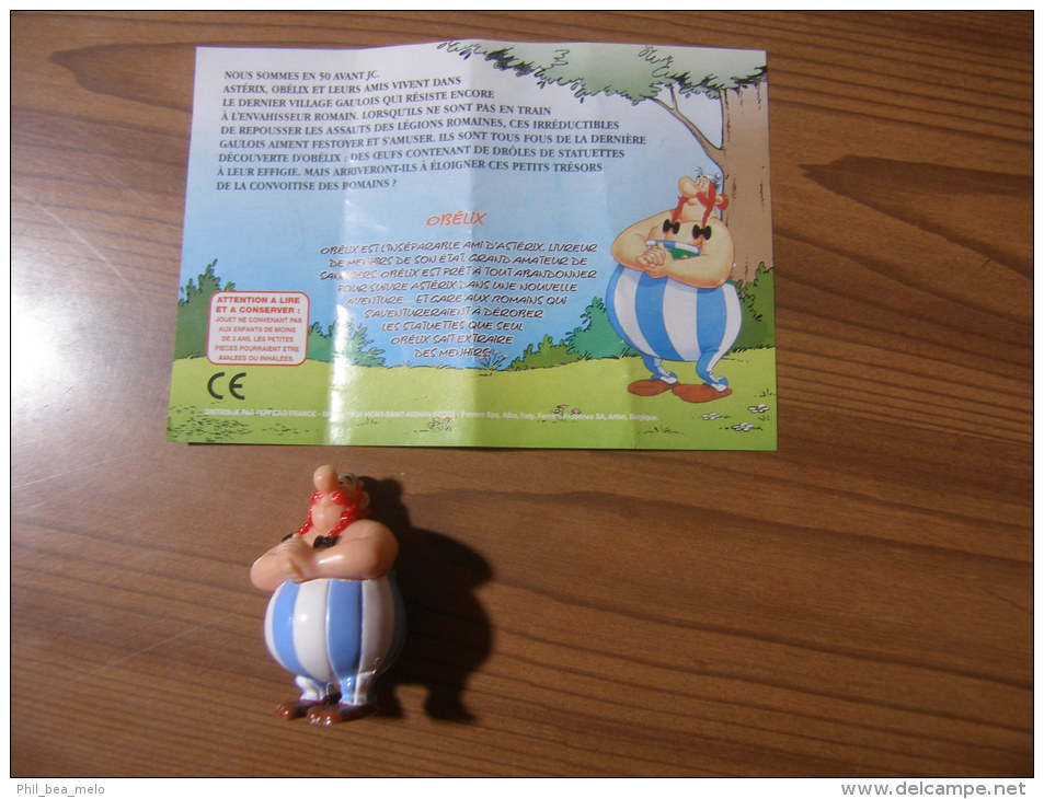 ASTERIX ET LES ROMAINS - FIGURINE KINDER 2003 - SERIE FRANCAISE - OBELIX + BPZ - Astérix