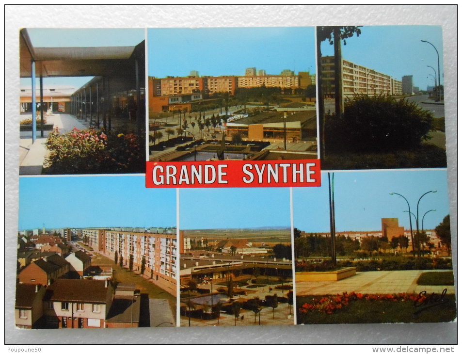 CP 59  Souvenir De GRANDE SYNTHE  - Multivue - Immeubles , Cités , HLM ( Vers Dunkerque Calais  ) - Grande Synthe