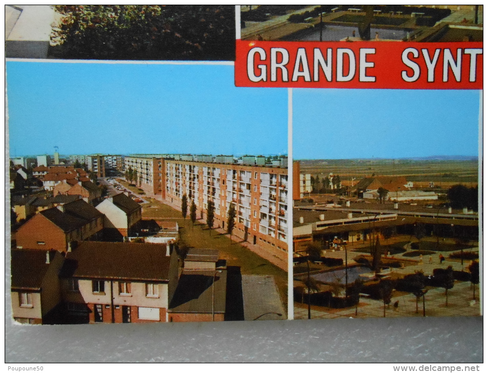 CP 59  Souvenir De GRANDE SYNTHE  - Multivue - Immeubles , Cités , HLM ( Vers Dunkerque Calais  ) - Grande Synthe