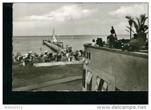 Timmendorfer Strand Landungsbrücke Strandkorb Cafe Terrasse Segelboot 5.4.1953 - Timmendorfer Strand