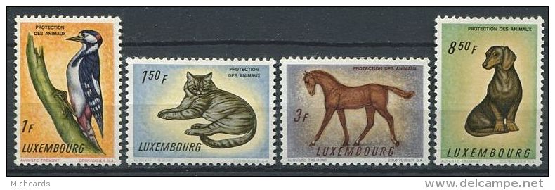 LUXEMBOURG 1961 - Chien Chat Oiseau Cheval - Neuf AVEC Legere Trace Charniere (Yvert 595/98) - Neufs