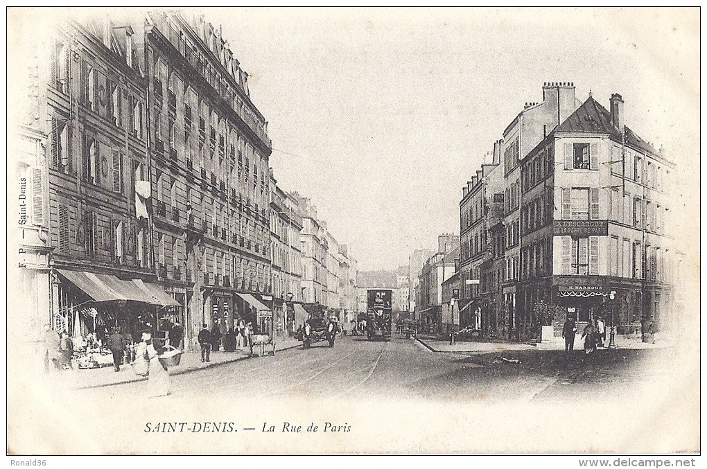 Cp 93 SAINT ST DENIS La Rue De Paris  ( Tramway Habitation Commerce A L'ESCARGOT Magasin ) - Saint Denis