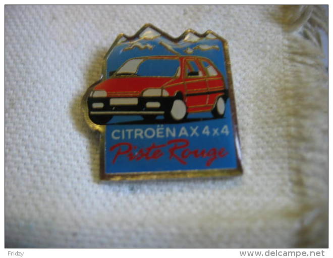 Pin´s Citroen AX 4x4 Piste Rouge - Peugeot