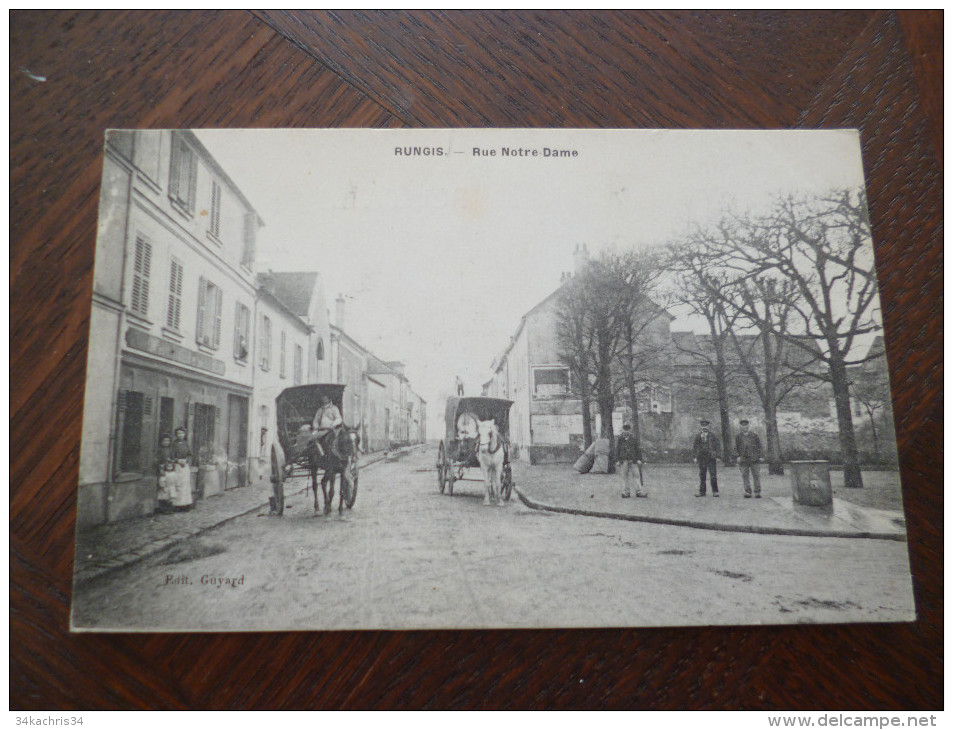 CPA Rungis.Rue Notre Dame.attelage.Magasins - Rungis