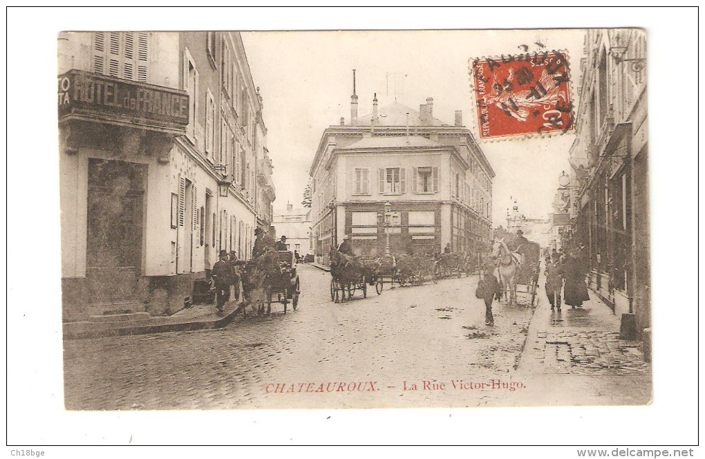 CPA :36 - Indre - Châteauroux : La Rue Victor Hugo : Hôtel France - Nombreux Attelages - Immeubles - Peu Commune - Chateauroux