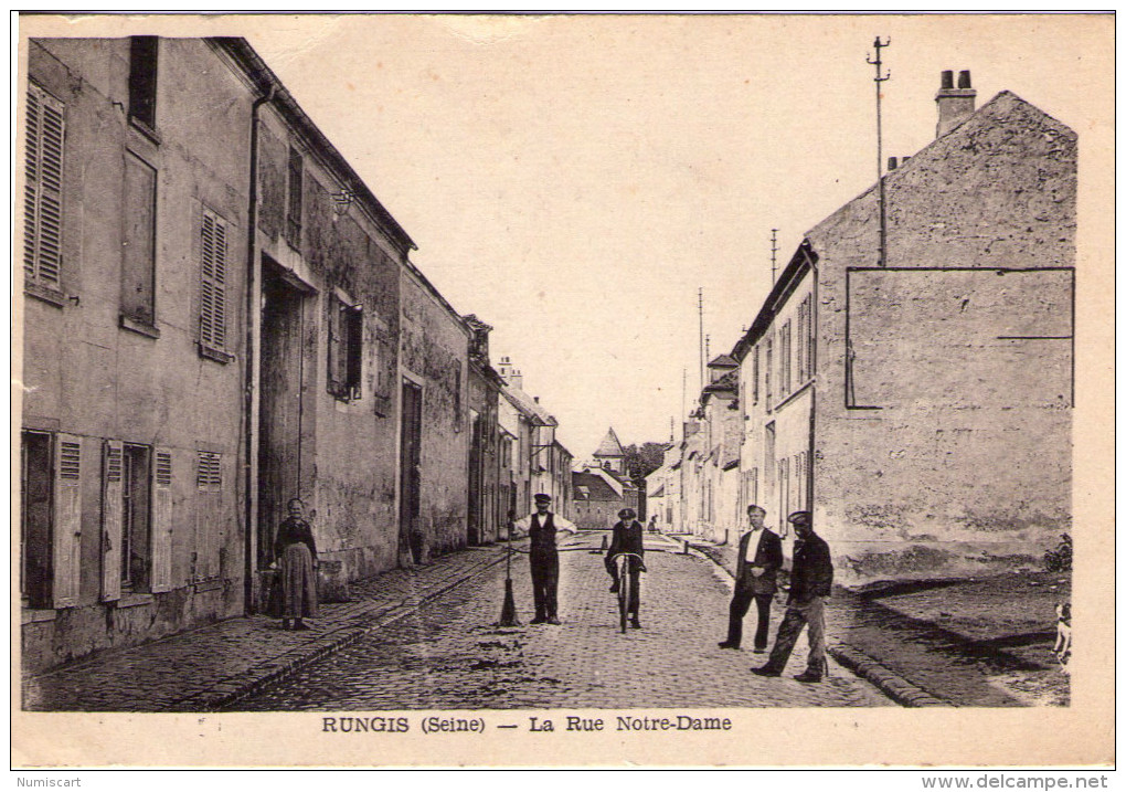 Rungis..animée..la Rue Notre-Dame..cycliste - Rungis