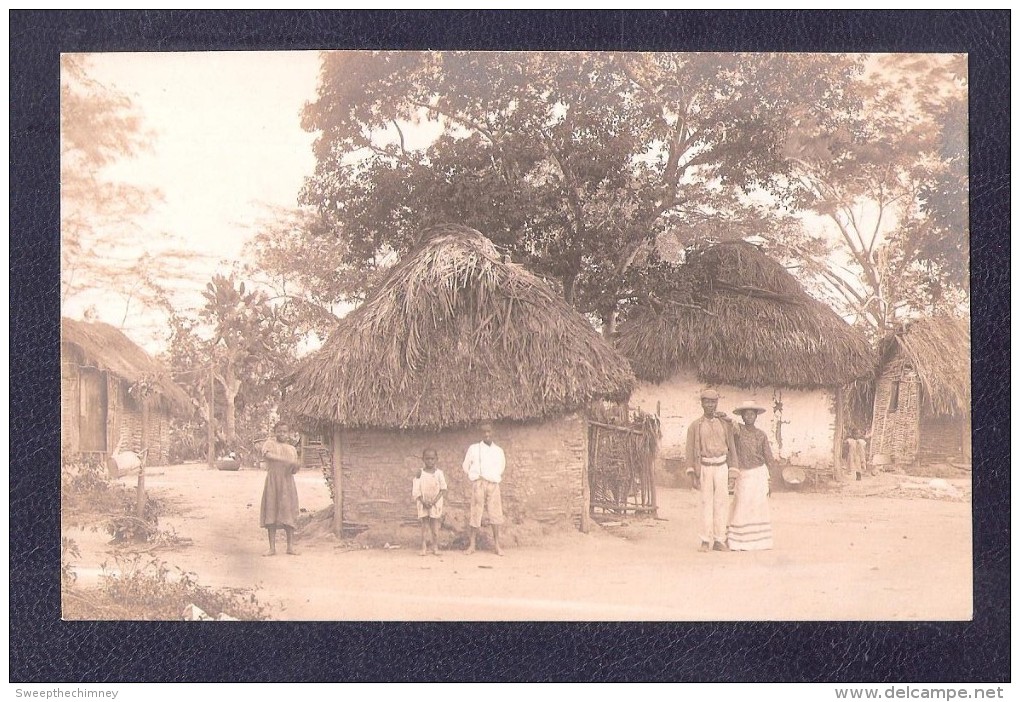 RP MUD HUT VILLAGE ETHNIC UNIDENTIFIED POSTCARD UNKNOWN LOCATION Who Knows ?  ISLAND WEST INDIES ? - Other & Unclassified