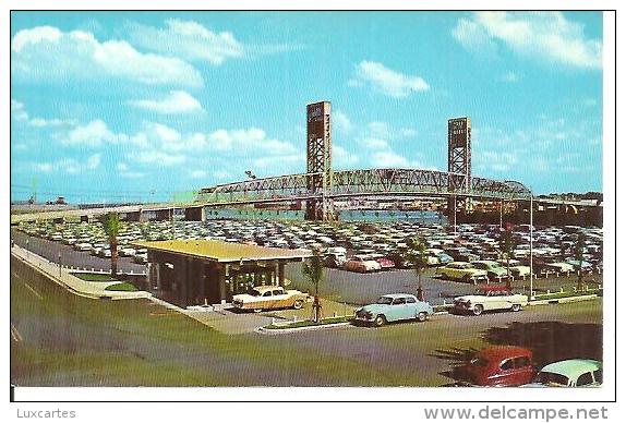 OVERLOOKING JACKSONVILLE'S LARGE AND SPACIOUS MUNICIPAL PARKING LOT. - Jacksonville