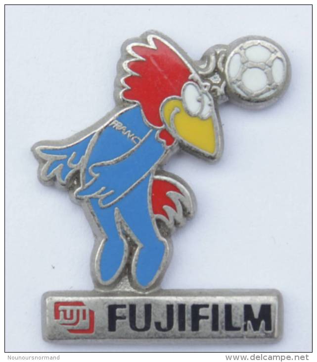 Pin's FUJIFILM - FOOTIX - Mascotte Coupe Du Monde 1998 - Arthus Bertrand - Zamac - D666 - Arthus Bertrand